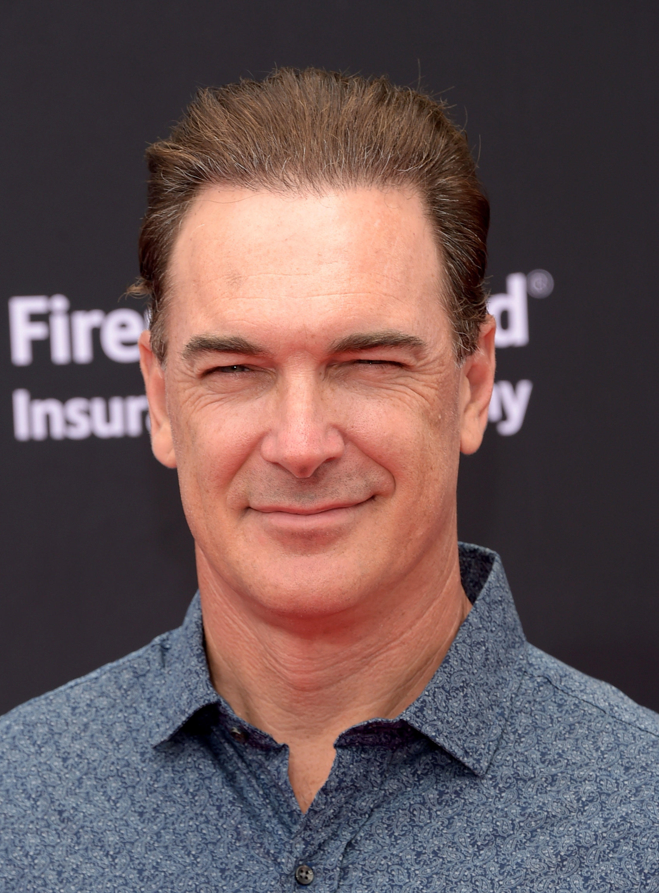 is patrick warburton bald